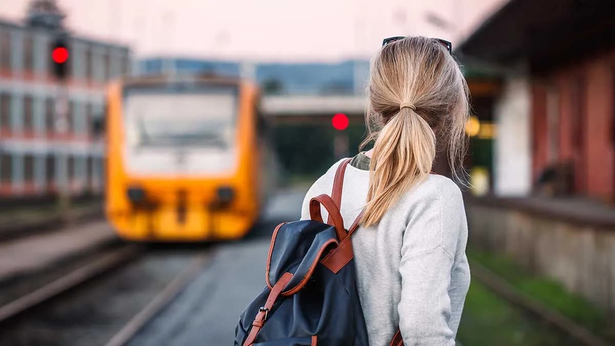 Solo traveler at a train station
