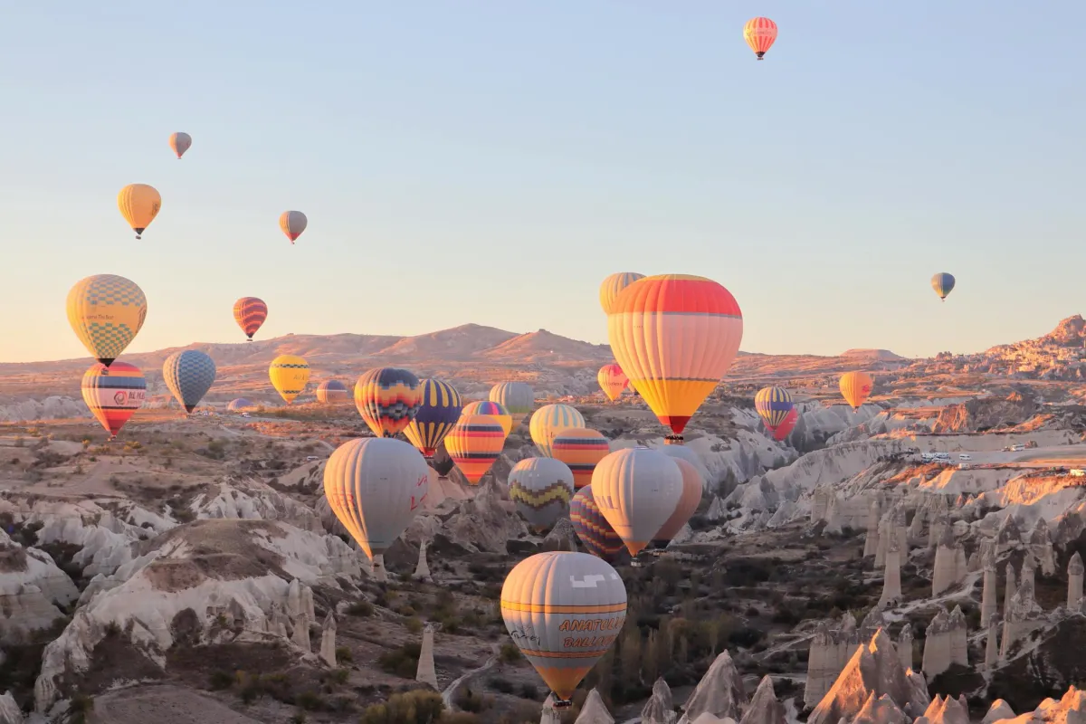 Hot air balloons over Cappadocia at sunrise